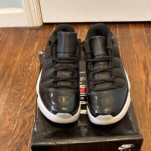 Nike Black and White Athletic Shoes with Red Accents